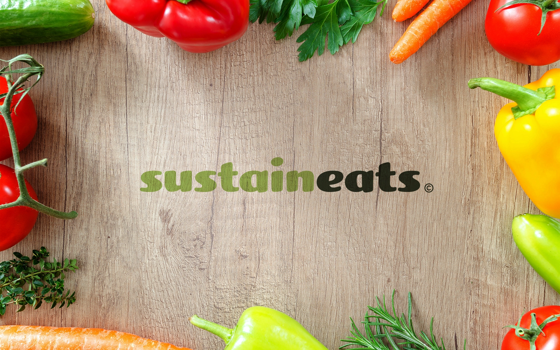 Logotipo da SustainEats em uma mesa de madeira